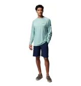 Remera deportiva de manga larga Columbia Terminal Tackle, color verde menta, con tecnología Omni-Shade y Omni-Wick. Presenta mangas raglán y logo de la marca estampado en el pecho y en la manga izquierda.
