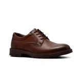 Zapato casual de cuero color marrón con cordones, diseño de estilo derby y suela de goma con relieve.