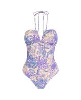 Malla enteriza con estampado floral en tonos violeta, azul y crema. Presenta un escote en V profundo con tirantes finos tipo halter que se atan al cuello.