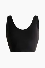 Top deportivo negro de tejido funcional con tecnología SoftMove™ y DryMove™, de corte ajustado, escote en V y tir Anchos.