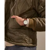 Reloj Skagen Signatur con caja plateada de 40mm, esfera color crema con tres subesferas y correa de cuero marrón.