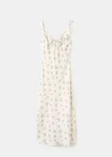 Vestido midi de viscosa color beige con estampado de flores azules, escote en V con volantes y tirantes finos ajustables.