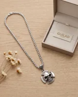 Collar de acero italiano con cadena de eslabones y dije en forma de calavera sobre una cruz.