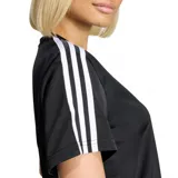 Remera Adidas Firebird negra con cuello redondo, mangas cortas y las tres rayas características de la marca en blanco a lo largo de los hombros y mangas. Incluye el logo del trébol de Adidas en el pecho.