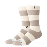 Medias Stance Stacked Up Crew a rayas horizontales color crema y gris.