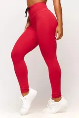 Calza deportiva roja de tiro alto con cordón ajustable en la cintura y logo estampado en la pierna.