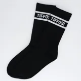 Medias de caña media color negro con franjas blancas horizontales y el nombre de la marca Tiffosi estampado en la parte superior.
