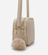 Bolso floater pequeño estructurado, color dorado, con cierre doble, texturizado, con correa transversal ajustable y tirador de pompón.