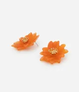 Aros tipo botón con forma de flor color naranja.