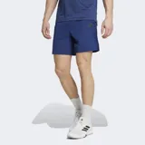 Short deportivo Adidas de entrenamiento, color azul, con ajuste ceñido y cintura elástica. Cuenta con tecnología CLIMACOOL para control de humedad y bolsillos laterales.