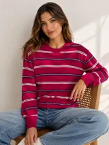 Sweater de punto en color bordó con diseño de rayas horizontales en blanco y negro. Presenta escote redondo a la base, mangas largas con puños acanalados y un calce holgado.
