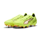 Championes de fútbol Puma Ultra 6 Match FG/AG, color amarillo flúor con detalles en negro y naranja. Presentan el logo Puma en el lateral y suela con tapones moldeados para césped natural y artificial.