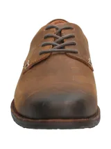 Zapato de cuero engrasado marrón oscuro, estilo urbano, con cordones y suela de goma.