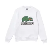 Buzo blanco de algodón con cuello redondo y mangas largas. Estampado frontal con el logo de Lacoste pixelado en verde y rojo, y el logo de Minecraft debajo.