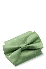 Moña amarilla con estampado floral y pañuelo de bolsillo a juego, presentados en caja negra.