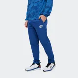 Pantalón deportivo Umbro del Club Nacional de Football, modelo Grok, color azul. Presenta el escudo del club en una pierna y el logo de Umbro en la otra.