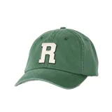 Gorra Rip Curl estilo dad hat de color verde, con visera curva y un parche frontal bordado con la letra "R" en color blanco y contorno negro.