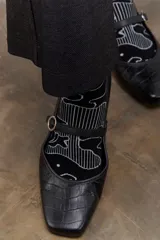 Set de tres pares de medias de caña media con diseños estampados.