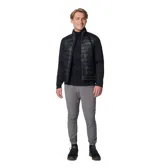 Pantalón técnico Columbia de corte ajustado en color gris, con cintura elástica ajustable mediante cordón y puños elásticos en los tobillos. Presenta paneles reforzados en la parte superior y bolsillos laterales y traseros con cierre.