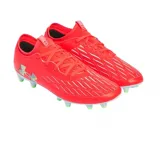 Championes de fútbol Under Armour Magnetico Select 4 FG, color negro con detalles en verde neón. Presentan un diseño aerodinámico con texturas en la parte superior y suela con tapones para césped natural.