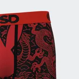 Calzoncillos tipo bóxer de PSD con estampado de dragones y conejos de Playboy en color rojo sobre fondo negro. Cintura elástica roja con logo de PSD en negro.