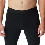 Calza técnica de compresión color negro, diseñada como primera capa térmica. Cuenta con tecnología reflectante para retener el calor corporal y tejido hidroabsorbente para eliminar el sudor. Presenta costuras planas ergonómicas y elasticidad en cuatro direcciones para mayor movilidad.