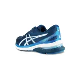 Championes de running Asics modelo Gel-Nagoya 4, color negro con detalles en blanco y gris. Presentan una estructura de malla transpirable, cordones ajustables y suela con tecnología de amortiguación.