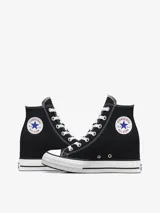 Zapatillas Converse Chuck Taylor All Star Wedge de caña alta, color negro, con cierre de cordones, puntera de goma y cuña interior de 7.5cm.
