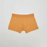 Pack de tres bóxers lisos en azul, naranja y azul marino.