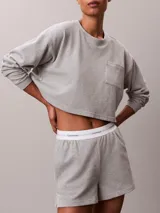 Shorts de estar por casa Calvin Klein confeccionados en punto de algodón, con cintura elástica con logo de la marca y bolsillos laterales.