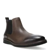 Bota tipo Chelsea de cuero con acabado degradado, paneles laterales elásticos y suela de goma con detalle de costura en el borde.