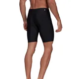 Short de baño negro ajustado, con logo Adidas blanco en la pierna derecha.