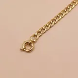 Pulsera tipo grumet de eslabones gruesos y pulidos, confeccionada en oro 18k.