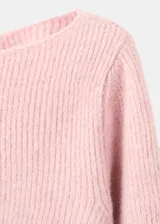Jersey de punto en canalé color rosado, con cuello redondo, manga larga y diseño entallado.