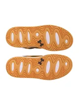 Championes Under Armour modelo UA U Court Anatomix, con diseño en color negro y amarillo, entresuela de EVA blanca y suela de goma marrón.