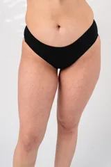 Culotteless negro de tiro bajo, forrado en su interior delantero, confeccionado con tela que contiene fibra LYCRA® XTRA LIFE™.