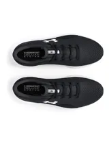 Championes de running Under Armour modelo Charged Surge 4, color negro con entresuela blanca. Presentan parte superior de malla transpirable con superposiciones sintéticas, amortiguación Charged Cushioning en la entresuela y suela de goma resistente.