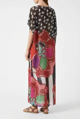 Túnica de micro tul estampada con tajos laterales.