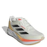 Championes de running Adidas modelo Duramo Speed, color beige con detalles en negro y naranja. Presentan una parte superior de malla transpirable, amortiguación Lightstrike en la entresuela y suela de goma resistente.