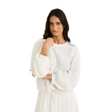 Buzo blanco de punto con cuello redondo y mangas largas abullonadas, con puños y dobladillo acanalados.