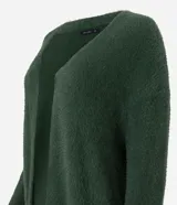 Cardigan largo de punto con textura de pelos, color negro, con mangas largas y bolsillos frontales. Diseño abierto y versátil de la marca Cortelle.