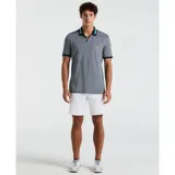 Polo gris jaspeado de algodón orgánico, corte slim fit, con cuello y puños acanalados en azul marino, celeste y blanco. Logo de pingüino bordado en el pecho.