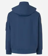 Campera rompevientos azul marino con capucha, cierre frontal y bolsillos laterales. Presenta estampado de NASA en el pecho, parche de bandera estadounidense en la manga y bolsillo utilitario en el brazo.