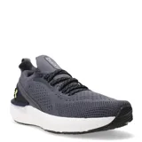 Championes de running Under Armour Shift para hombre, color gris oscuro con malla transpirable, cordones negros y detalles en amarillo neón. Presentan una entresuela gruesa de espuma blanca para amortiguación y un estabilizador de talón en azul marino.