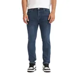 Pantalón de denim Quiksilver modelo Rin, corte ajustado, color azul oscuro con sutil efecto desgastado.