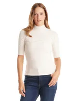 Remera de tejido rib marca Elie Tahari, color beige, con cuello mock y mangas cortas. Presenta un pequeño avío metálico con logo en el ruedo.