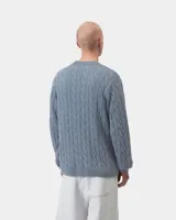 Sweater de punto con diseño de ochos, cuello redondo, mangas largas y corte holgado.