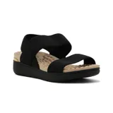 Sandalias de plataforma Modare para mujer, color negro con tiras elásticas acanaladas y plantilla texturizada en tono tostado.