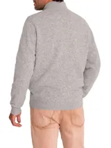 Sweater gris de lana y cashmere con cuello alto y cierre completo.