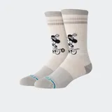 Medias Stance de largo medio color beige con rayas horizontales grises en la parte superior y diseño de Minnie Mouse haciendo deporte.